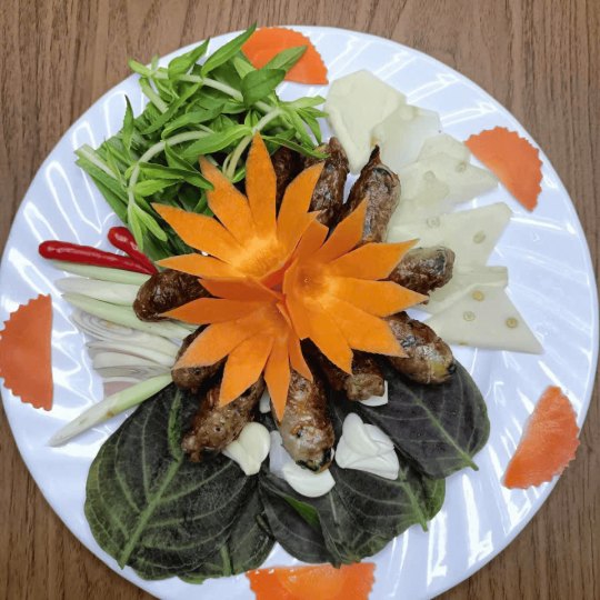 CHẢ ỐC CUỘN MỠ CHÀI